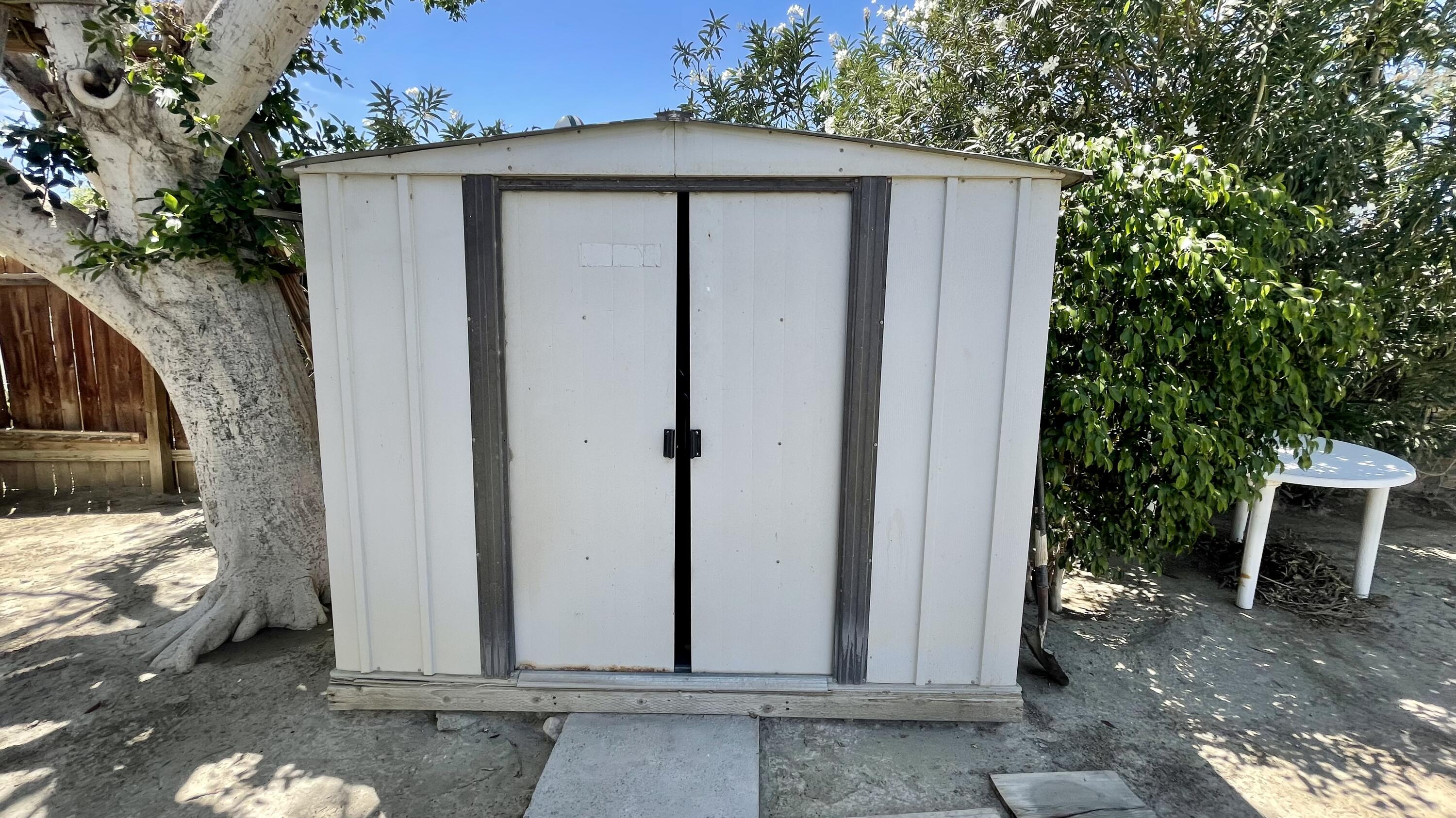 82116 Adobe Road Indio, CA 92201 - Photo 50 of 70 a view of a house with a sink and yard