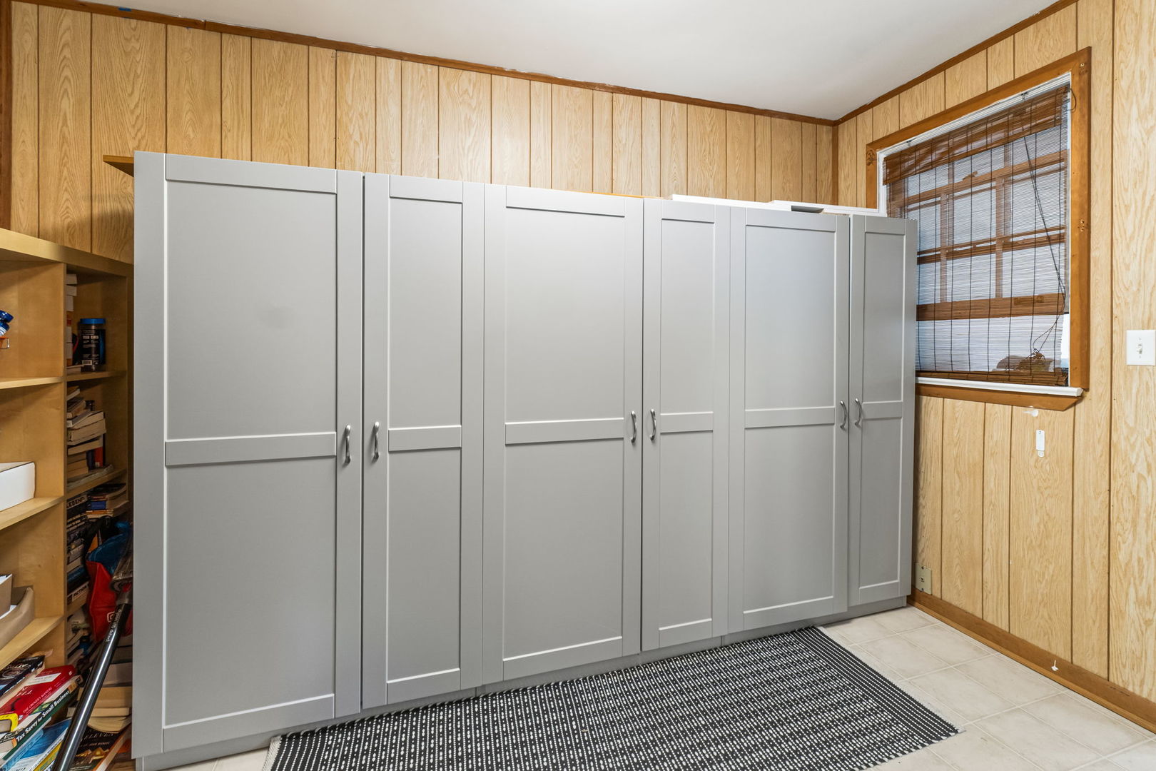 219 East Sheridan Road Lake Bluff, IL 60044 - Photo 15 of 28 a view of walk in closet with empty racks