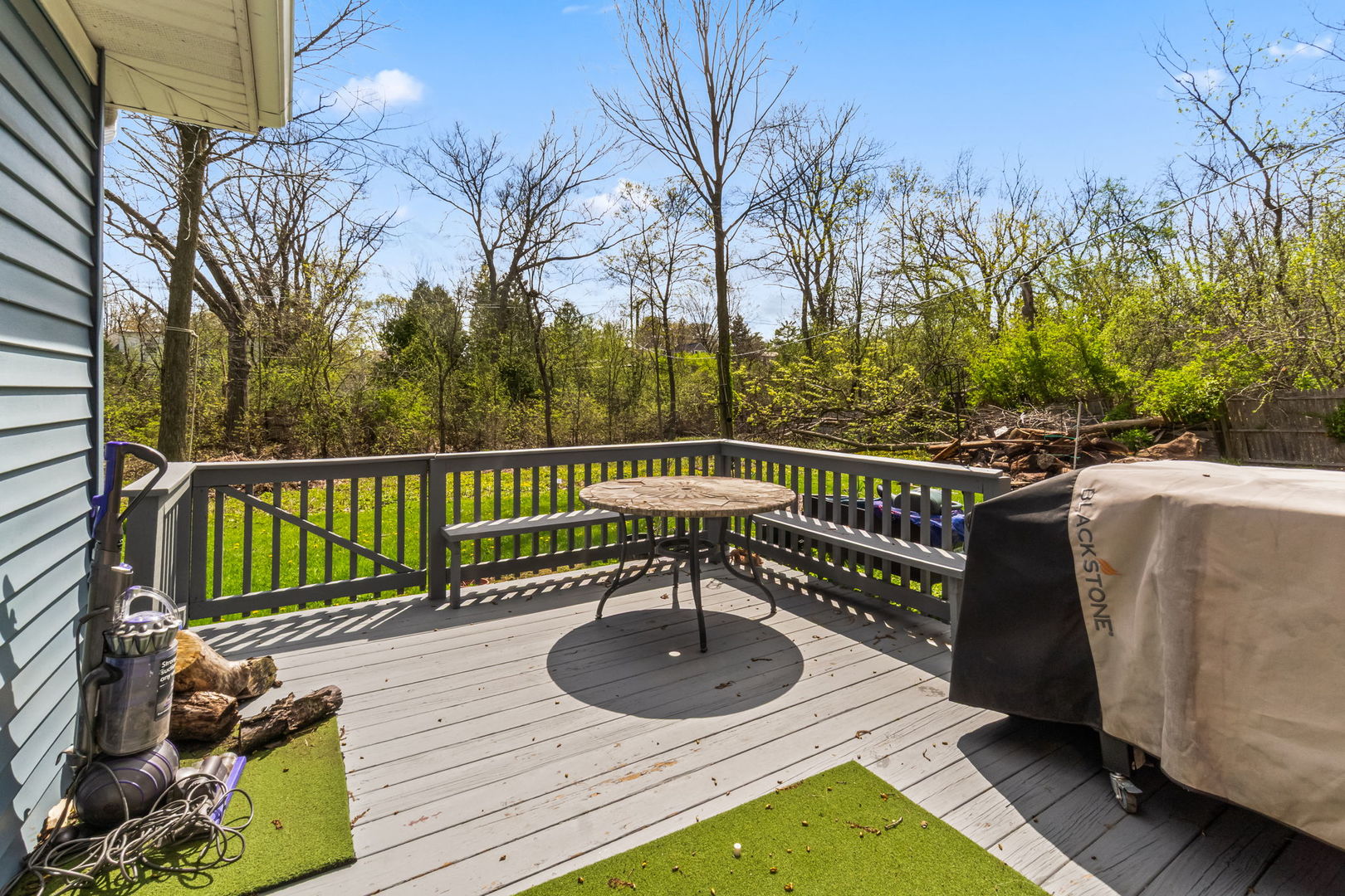 219 East Sheridan Road Lake Bluff, IL 60044 - Photo 25 of 28 a balcony with wooden floor table and chairs