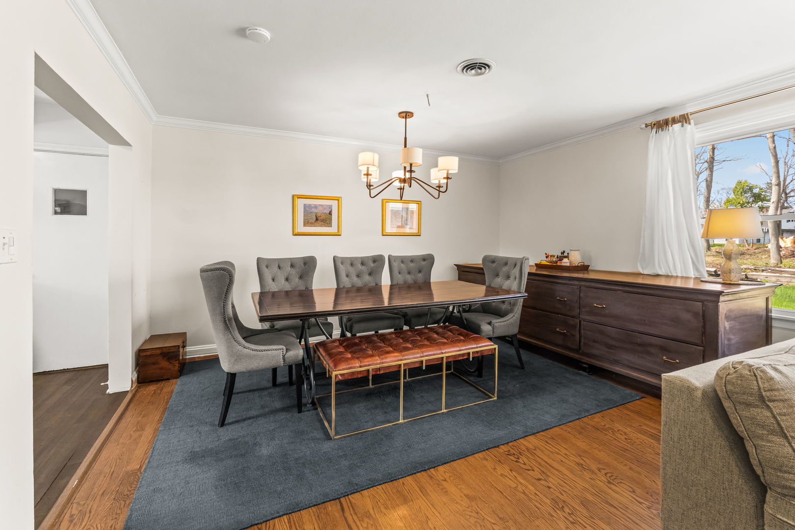 219 East Sheridan Road Lake Bluff, IL 60044 - Photo 9 of 28 a outdoor dining room with furniture a rug and wooden floor