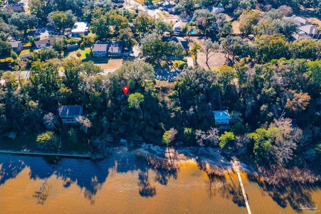 a view of swimming pool with a yard