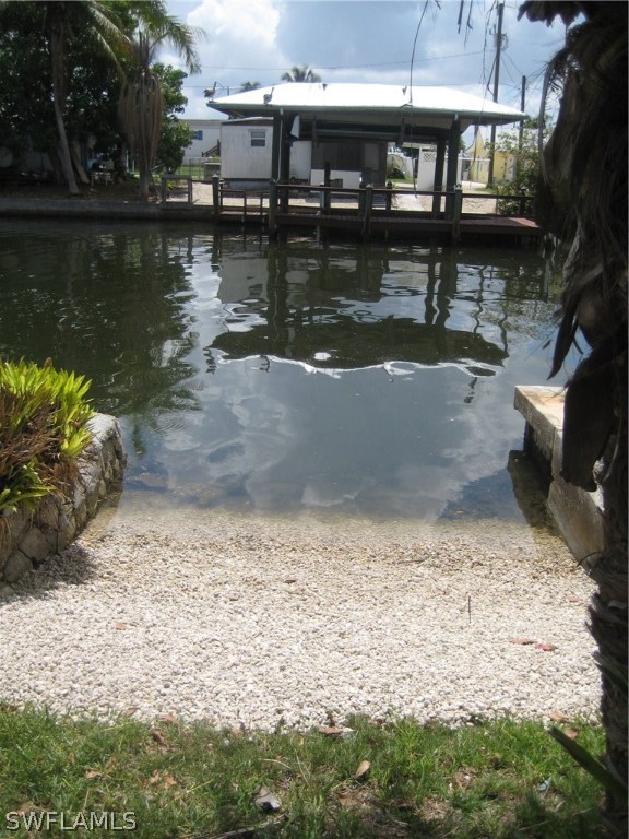 2567 Cay Cove Matlacha, FL 33993 - Photo 3 of 18 a view of swimming pool with a lake view