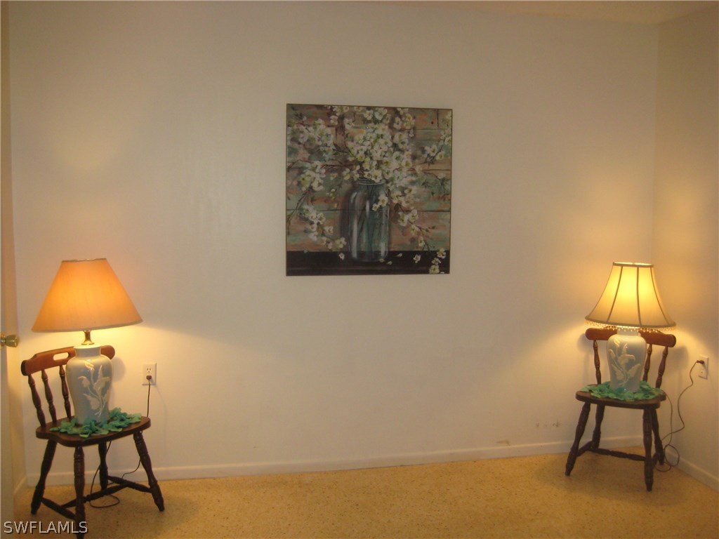 2567 Cay Cove Matlacha, FL 33993 - Photo 10 of 18 a room with a lamp and a window