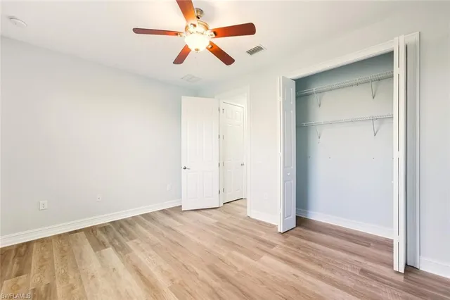 a bathroom with a tub a sink and a shower