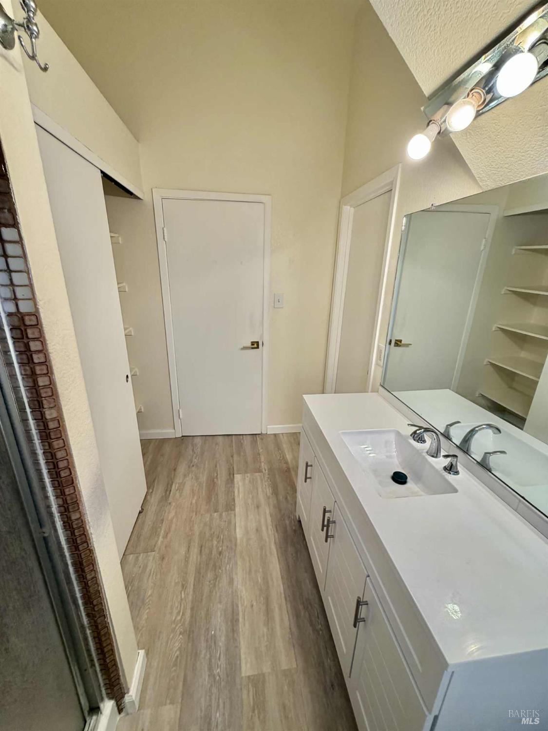 7086 Fircrest Avenue Sebastopol, CA 95472 - Photo 14 of 62 a bathroom with a sink and a mirror