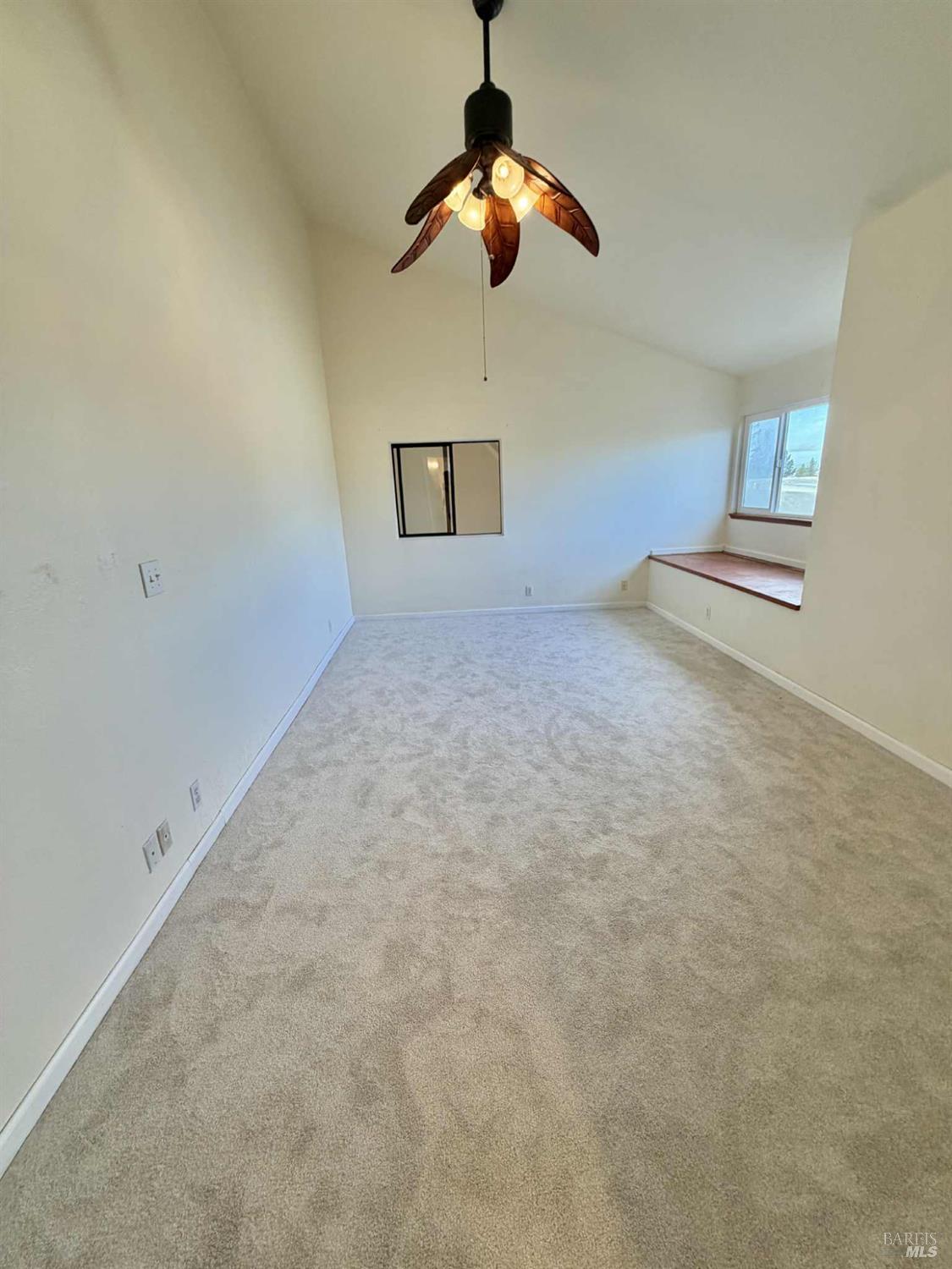 7086 Fircrest Avenue Sebastopol, CA 95472 - Photo 15 of 62 a view of a room with a ceiling fan and window