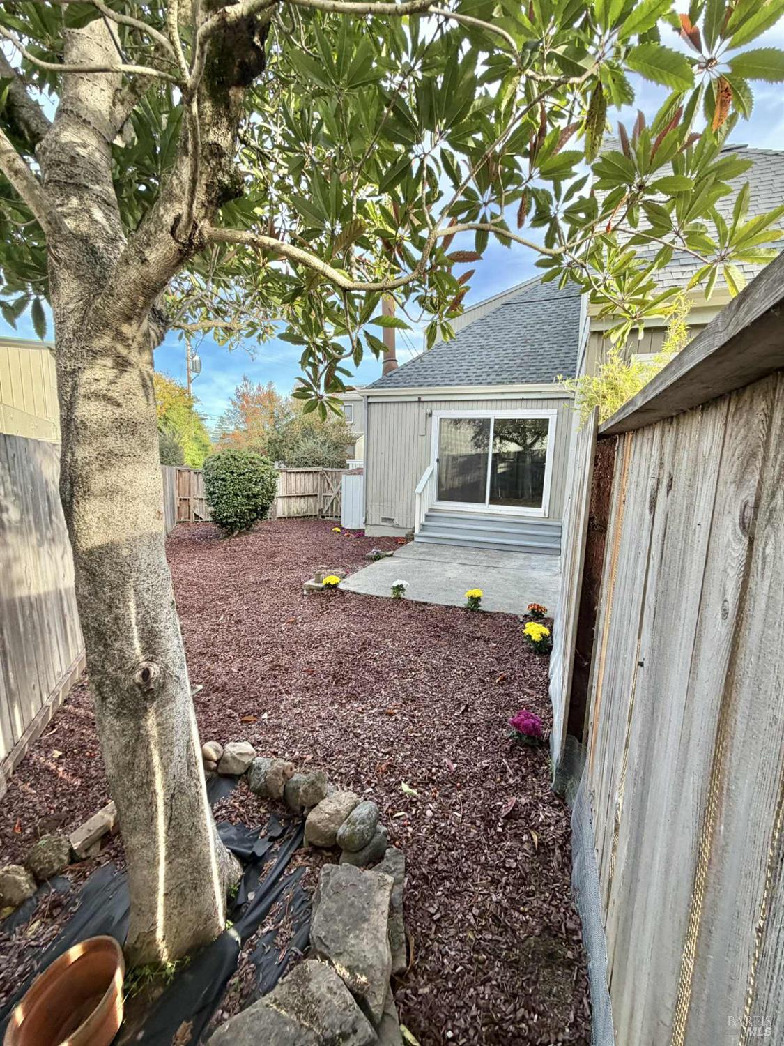 7086 Fircrest Avenue Sebastopol, CA 95472 - Photo 21 of 62 a backyard of a house with lots of green space