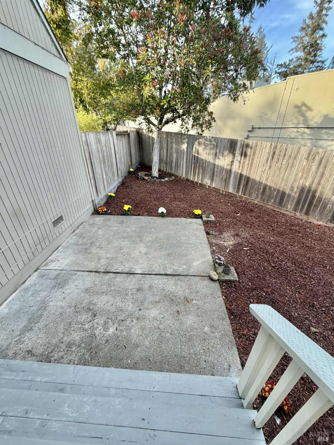 7086 Fircrest Avenue Sebastopol, CA 95472 - Photo 30 of 62 a view of a backyard with wooden fence
