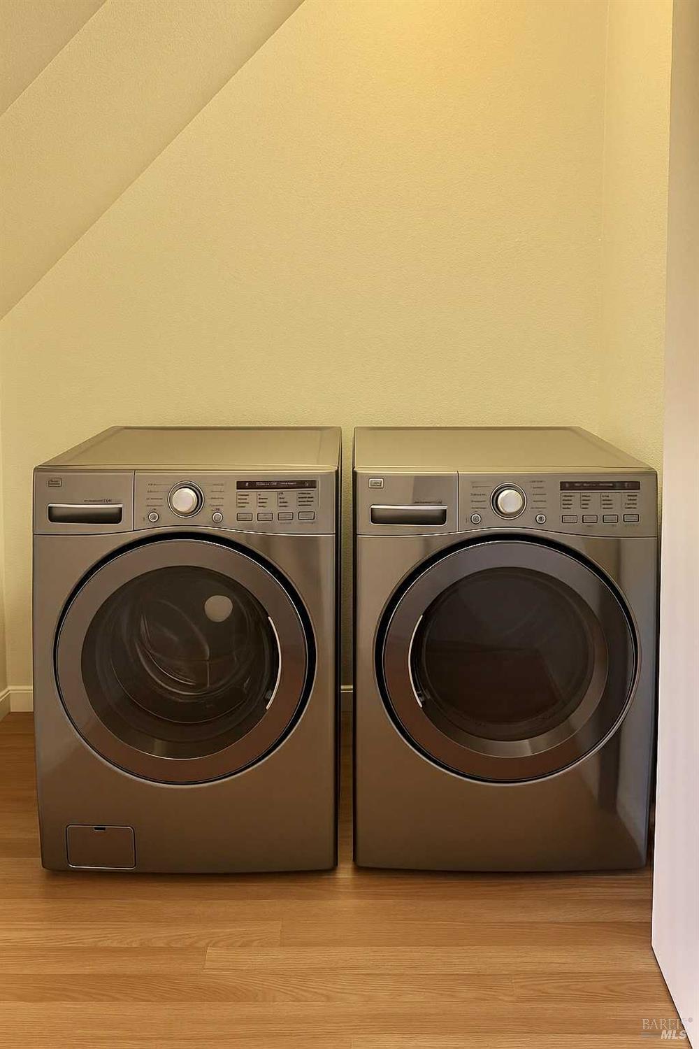 7086 Fircrest Avenue Sebastopol, CA 95472 - Photo 44 of 62 a utility room with dryer and washer