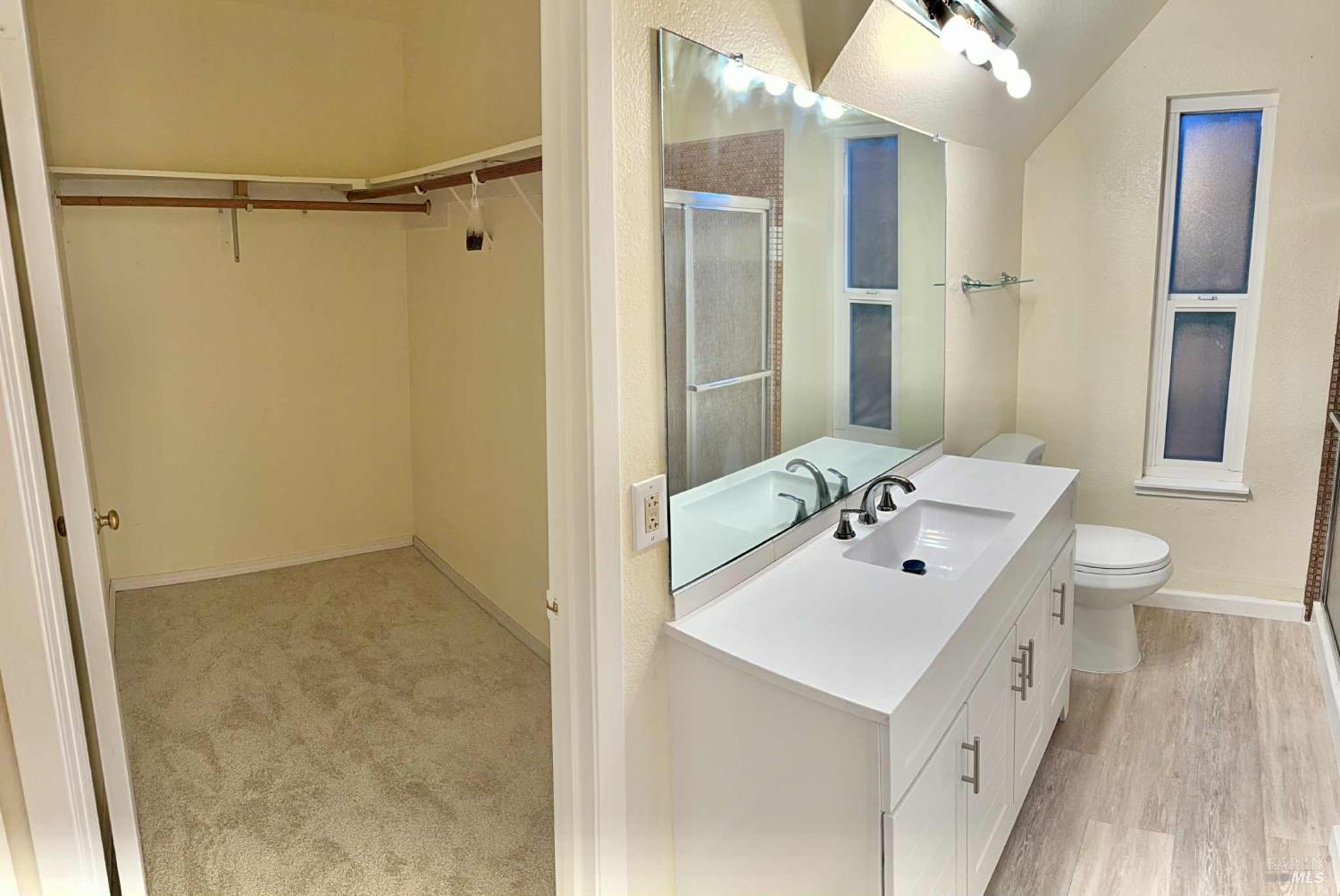 7086 Fircrest Avenue Sebastopol, CA 95472 - Photo 5 of 62 a bathroom with a double vanity sink a toilet and shower