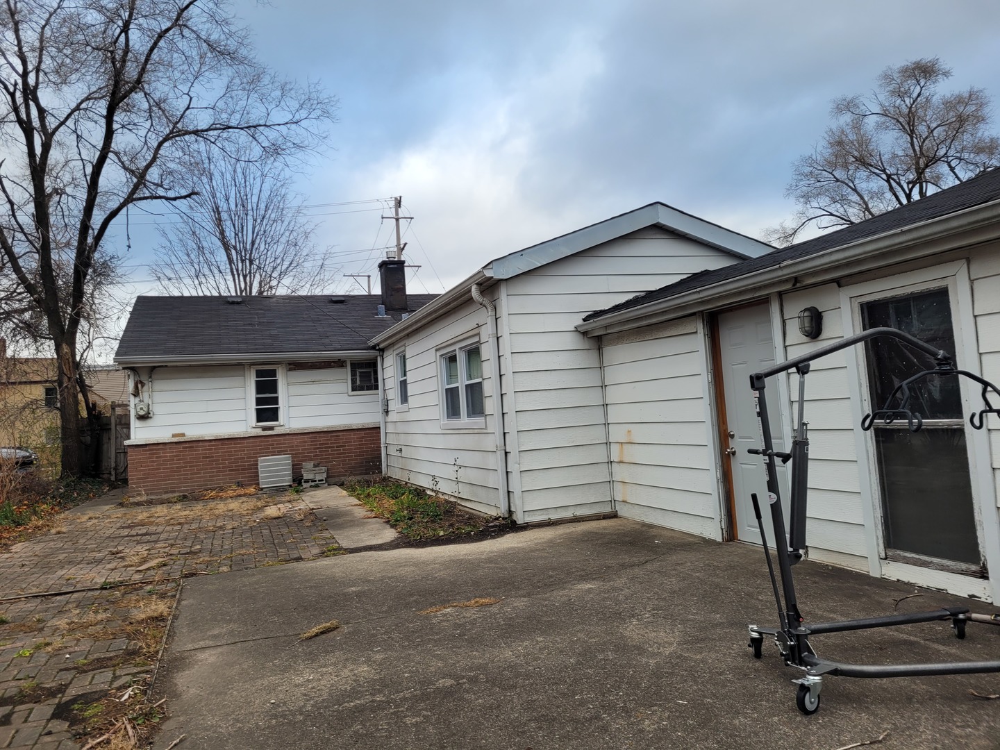 7911 45th Street Lyons, IL 60534 - Photo 5 of 15 a front view of a house with a yard