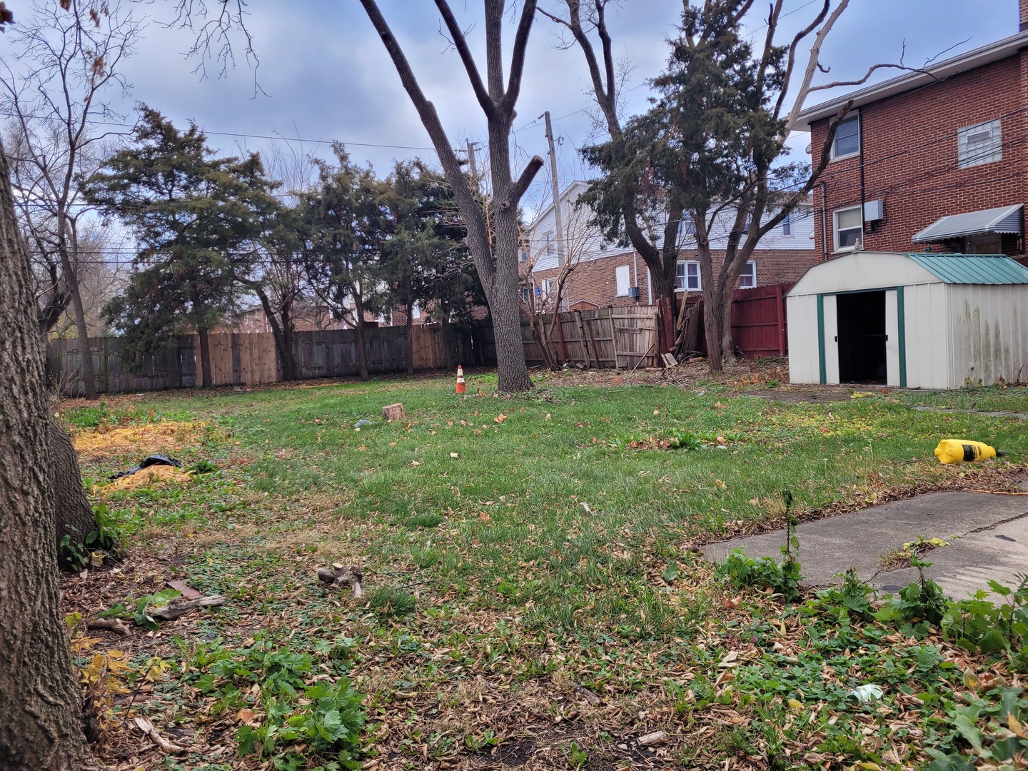 7911 45th Street Lyons, IL 60534 - Photo 6 of 15 a view of a backyard with a garden