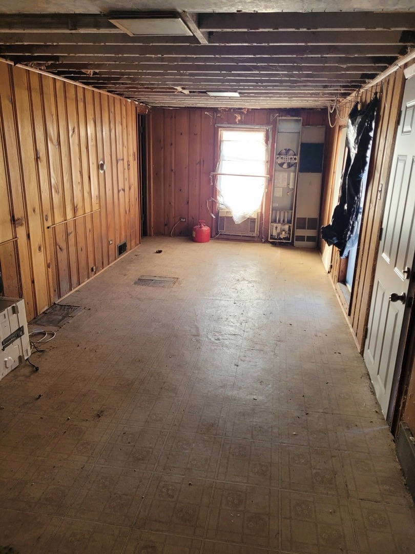 7911 45th Street Lyons, IL 60534 - Photo 8 of 15 a view of empty room with a fireplace