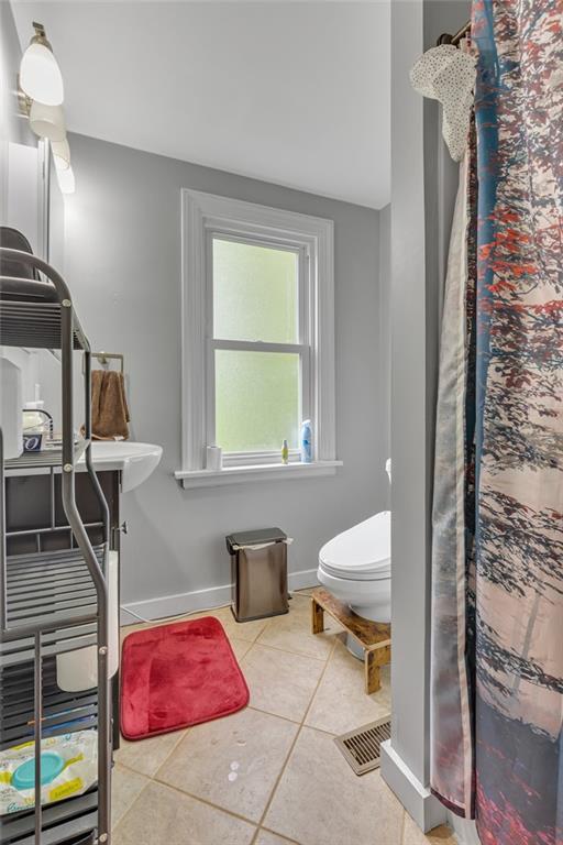 1205 Breitenstein Road Ambridge, PA 15003 - Photo 12 of 25 a living room with furniture and a window