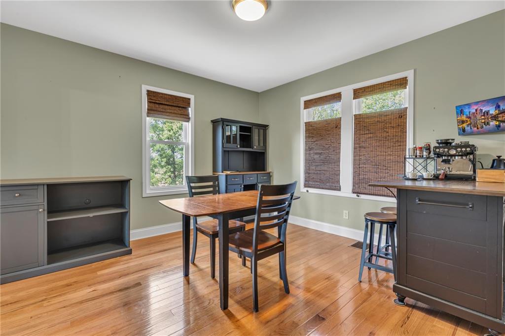 1205 Breitenstein Road Ambridge, PA 15003 - Photo 17 of 25 a view of a dining room with furniture window and wooden floor