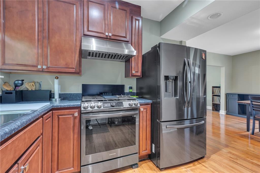 1205 Breitenstein Road Ambridge, PA 15003 - Photo 20 of 25 a kitchen with a stove top oven and refrigerator