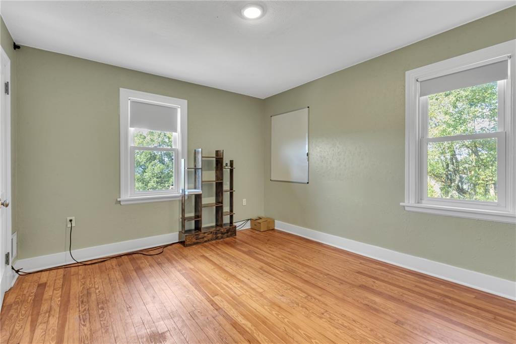 1205 Breitenstein Road Ambridge, PA 15003 - Photo 23 of 25 a view of empty room with wooden floor and fan
