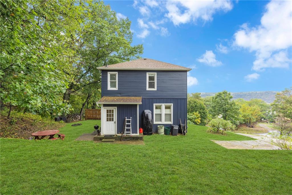 1205 Breitenstein Road Ambridge, PA 15003 - Photo 4 of 25 a front view of a house with a yard