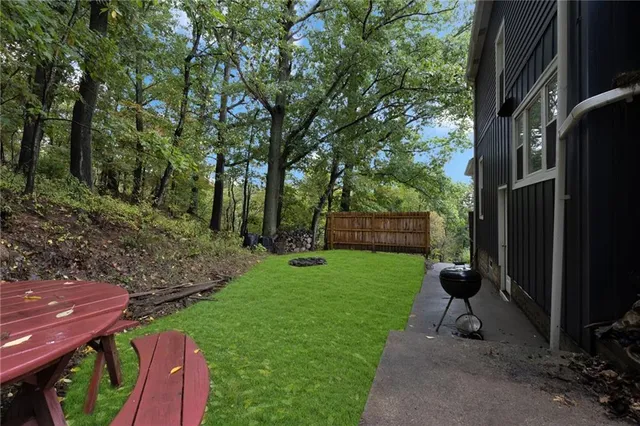 a view of a backyard with a trees