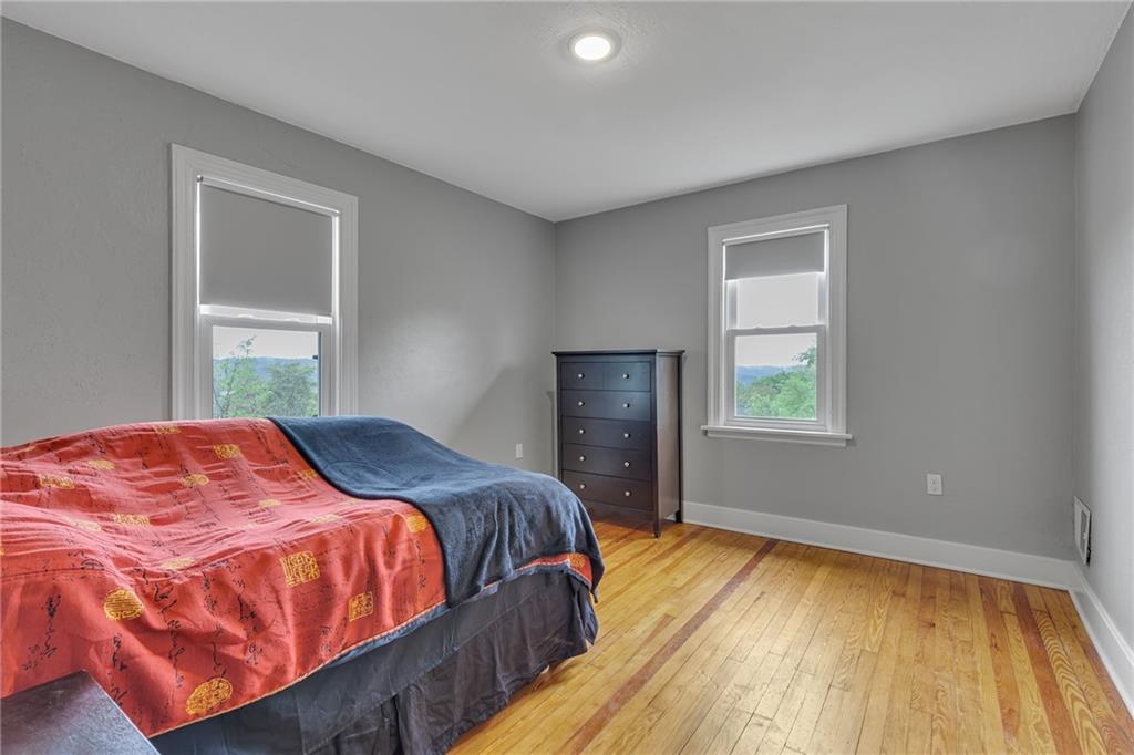 1205 Breitenstein Road Ambridge, PA 15003 - Photo 10 of 25 a bedroom with a bed and a window