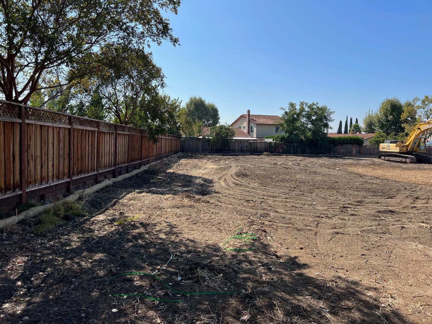 0 Brightwood Drive San Jose, CA 95148 - Photo 1 of 6 a backyard of a house with lots of green space