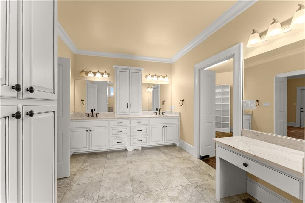 725 County Farm Road Jefferson, GA 30549 - Photo 31 of 66 a bathroom with a granite countertop sink mirror and a