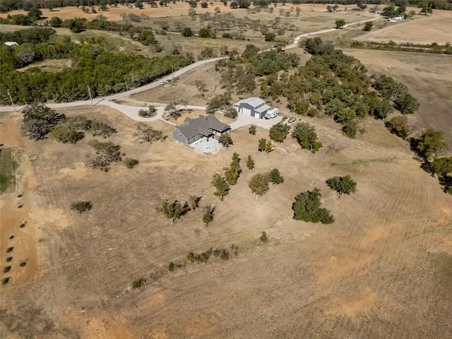 a view of a covered with snow on the road