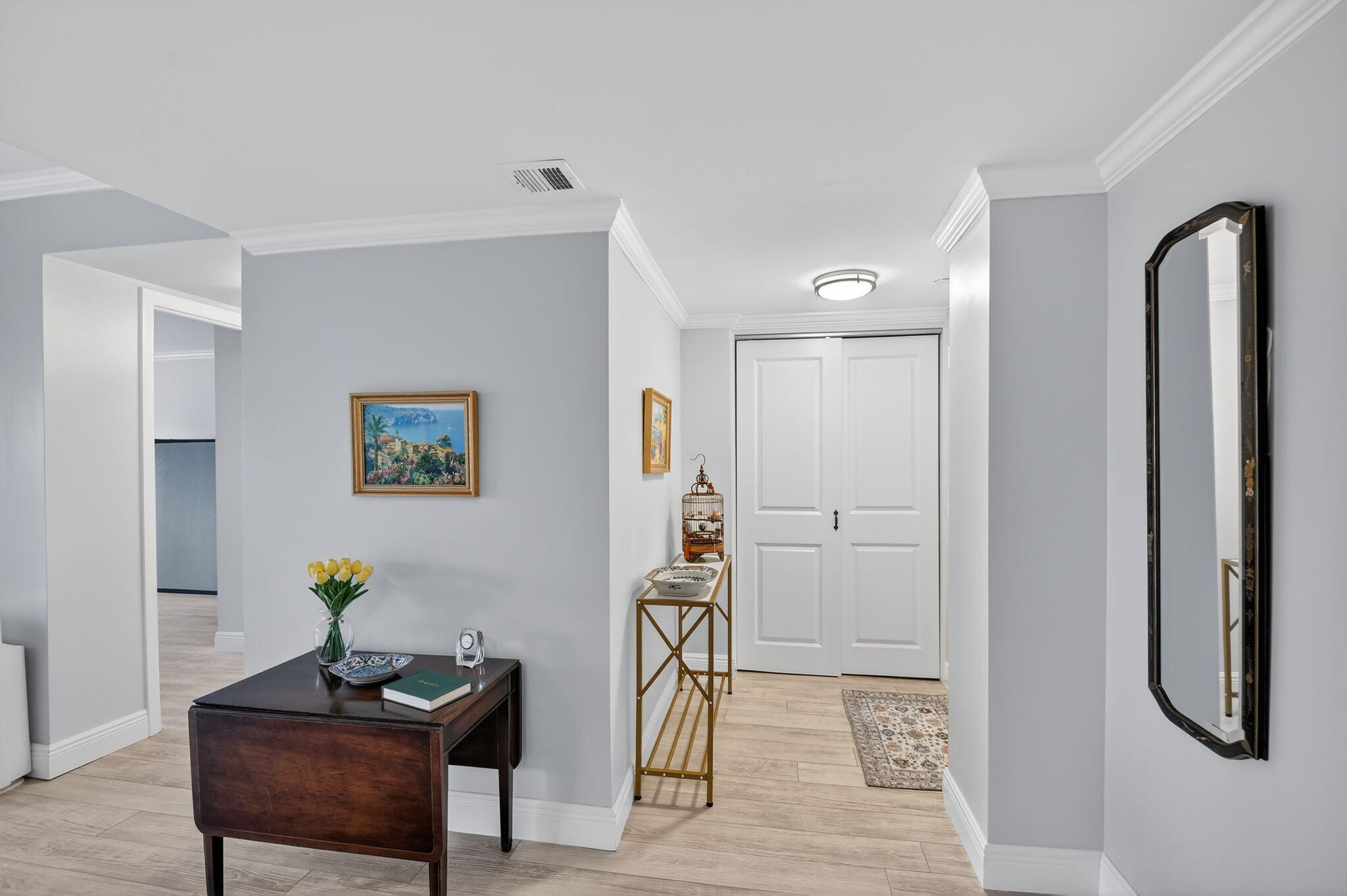 1801 South Flagler Drive, Unit 205 West Palm Beach, FL 33401 - Photo 2 of 16 a view of a workspace with furniture and wooden floor