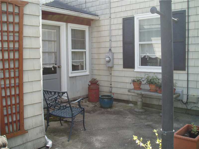 104 Beach Road Bristol, RI 02809 - Photo 13 of 21 Patio/Deck. SIDE ENTRANCE TO DINING ROOM AREA
