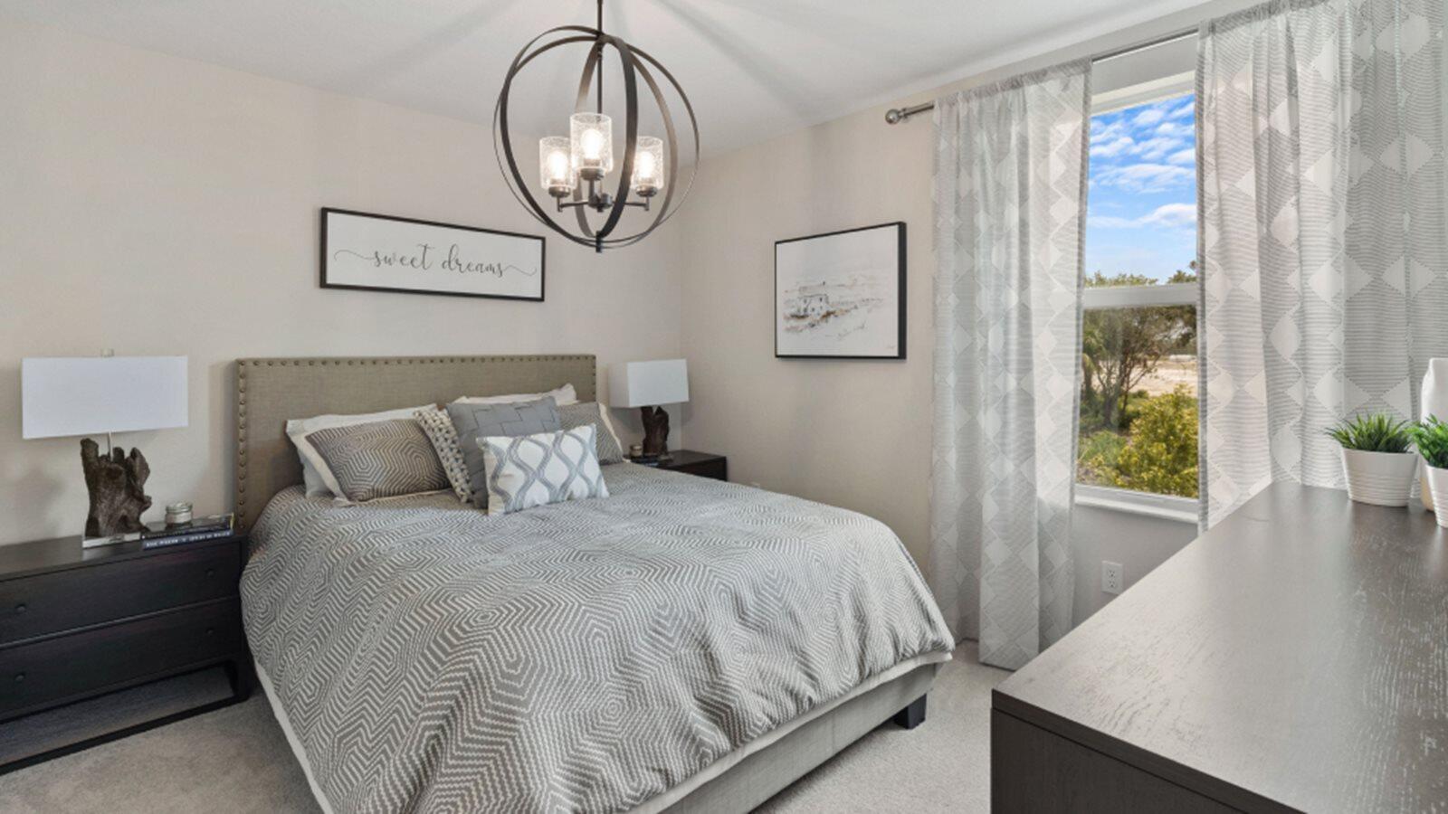 2211 Marigold Trail Palm Bay, FL 32907 - Photo 13 of 17 a bedroom with a bed and a window