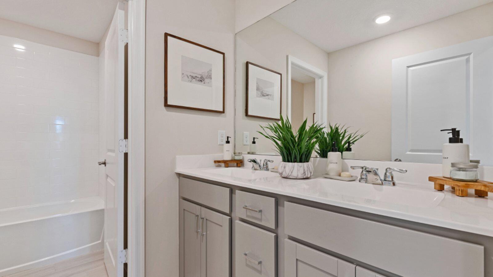 2211 Marigold Trail Palm Bay, FL 32907 - Photo 14 of 17 a bathroom with a sink and a mirror