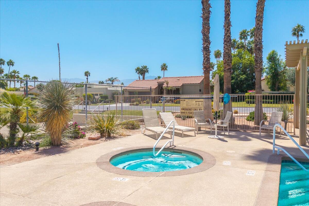 39 Santo Domingo Drive Rancho Mirage, CA 92270 - Photo 29 of 30 a view of a swimming pool with a patio