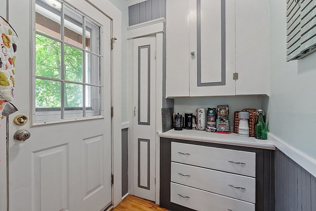 24 Maplewood Road Worcester, MA 01602 - Photo 17 of 42 a kitchen with cabinets and window