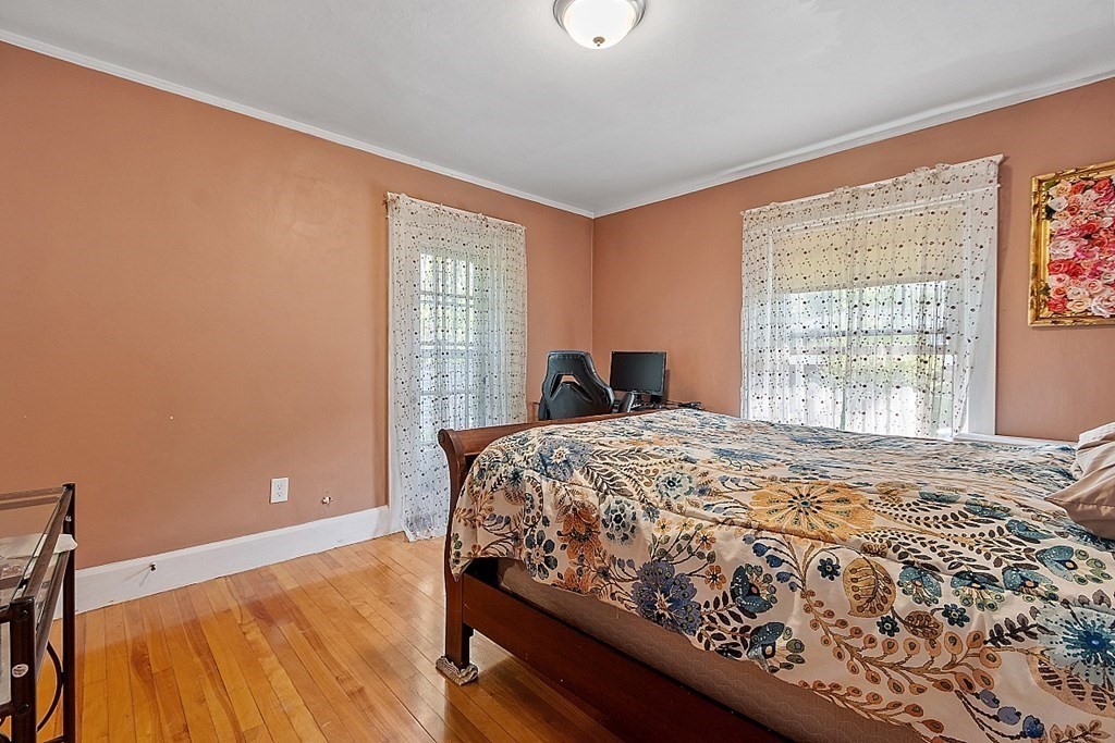 24 Maplewood Road Worcester, MA 01602 - Photo 28 of 42 a bedroom with a bed and a window