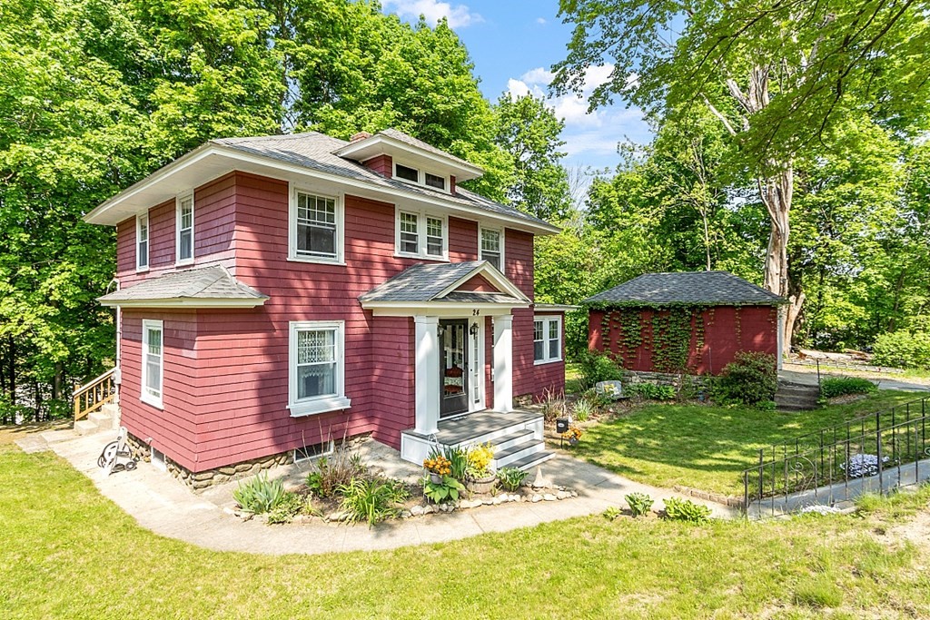 24 Maplewood Road Worcester, MA 01602 - Photo 3 of 42 a front view of a house with a yard