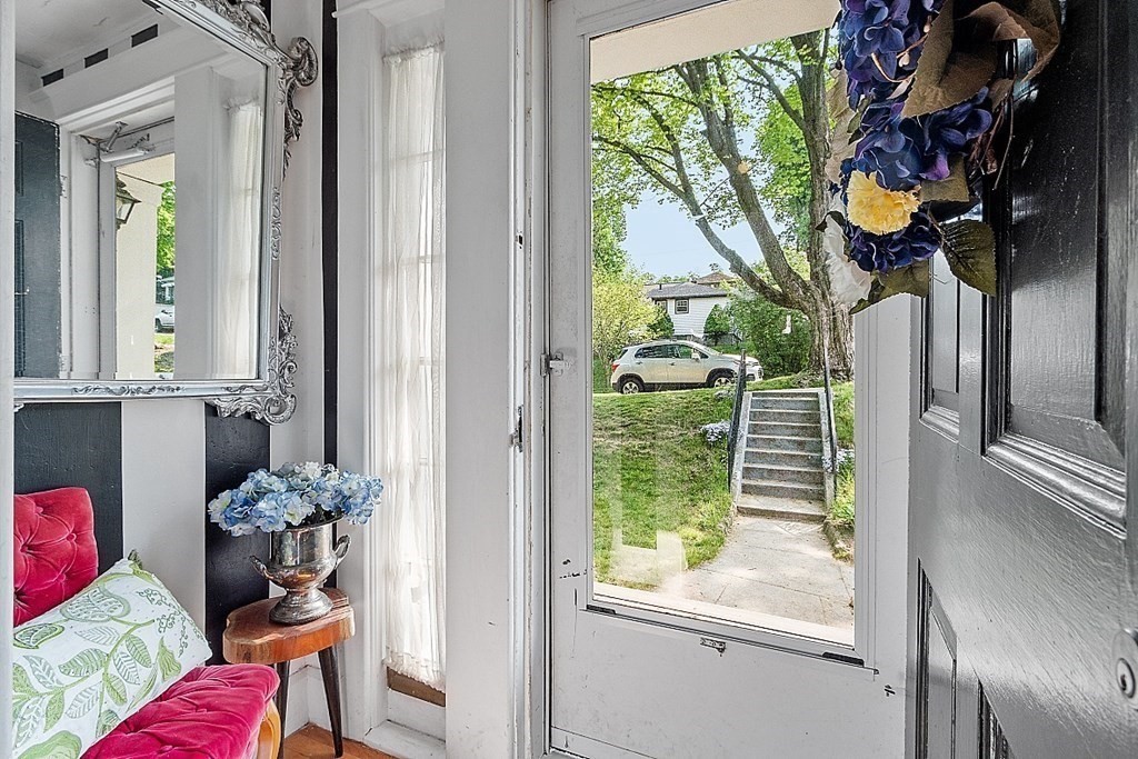 24 Maplewood Road Worcester, MA 01602 - Photo 33 of 42 a view of a porch with furniture and a potted plant