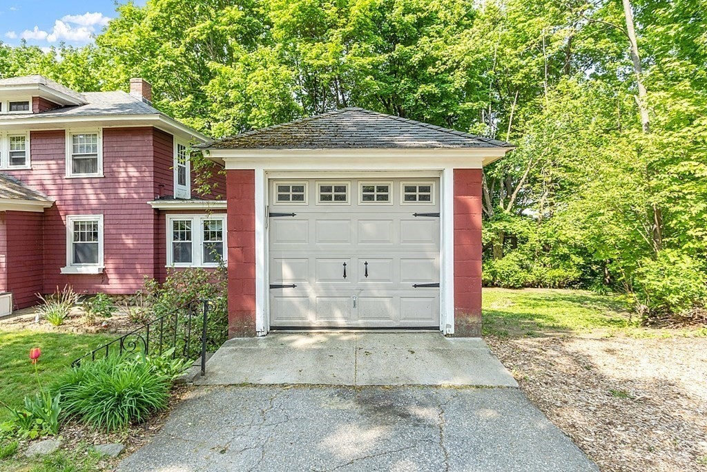 24 Maplewood Road Worcester, MA 01602 - Photo 39 of 42 a front view of a house with a garden