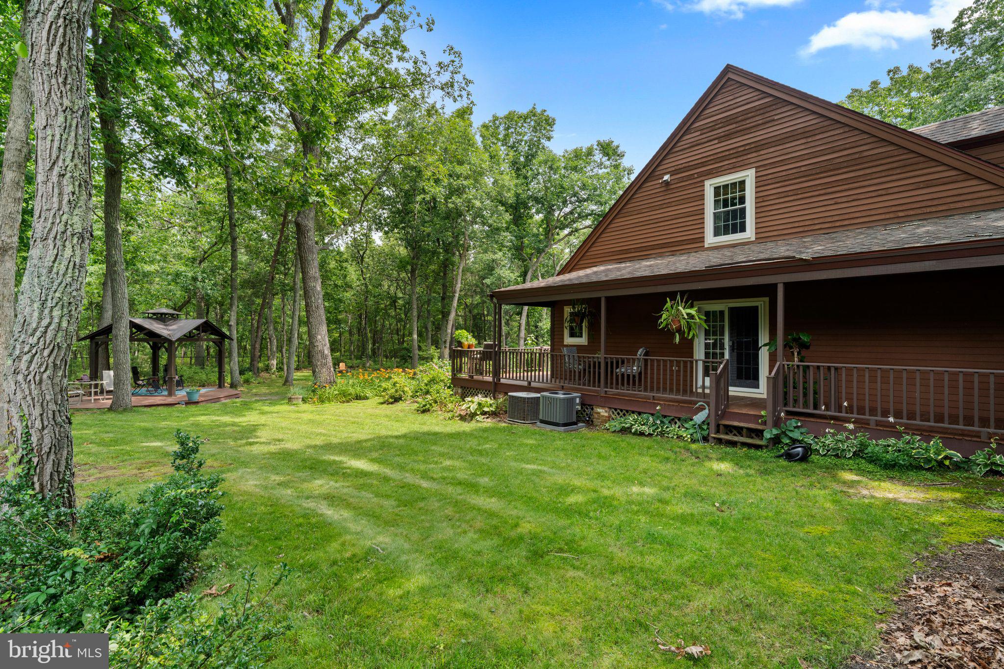 16 Dunhill Road Jackson, NJ 08527 - Photo 44 of 44 Charming home nestled in lush greenery.