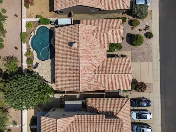 a view of a house with swimming pool