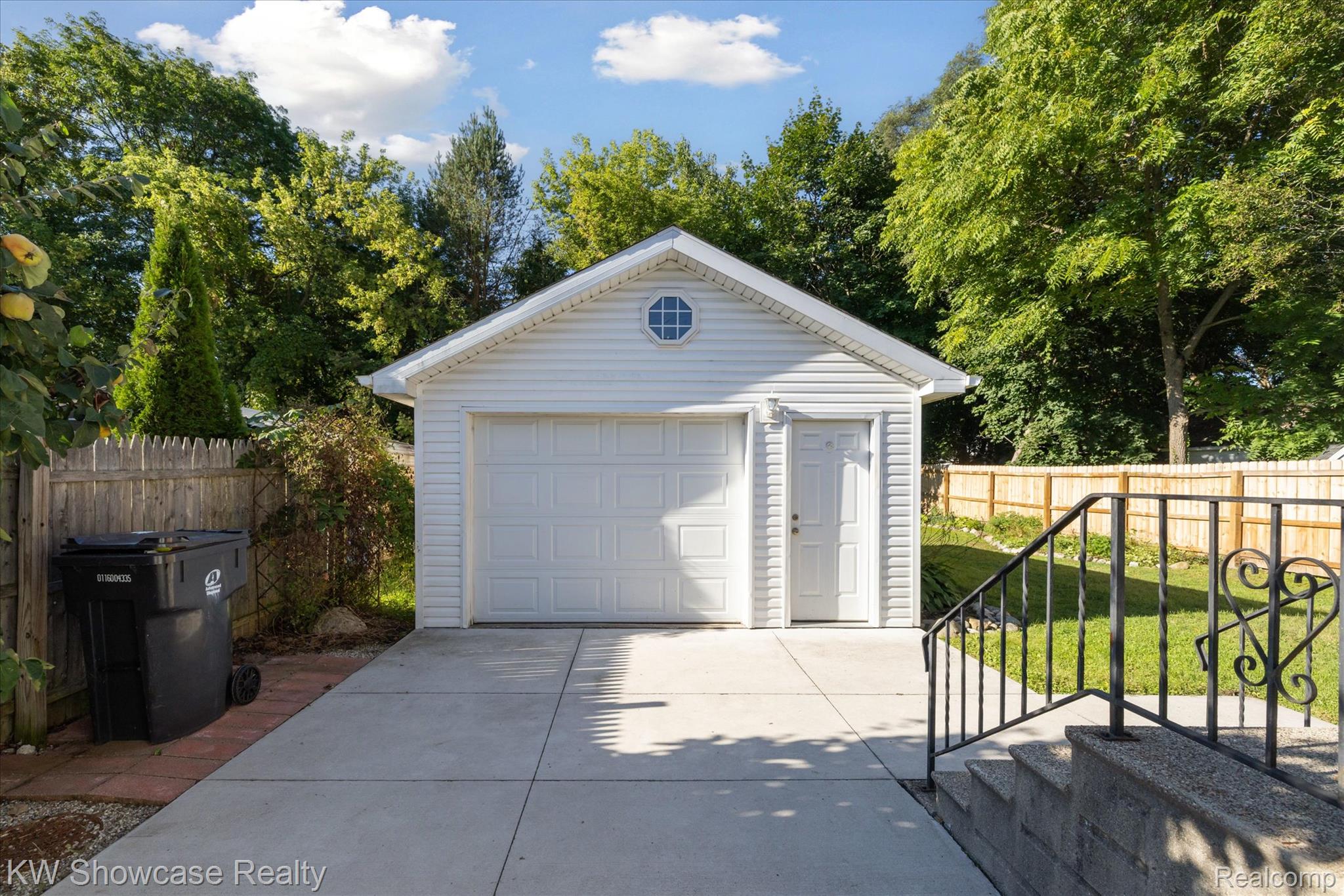603 West Clinton Street Howell, MI 48843 - Photo 22 of 25 Detached garage featuring driveway