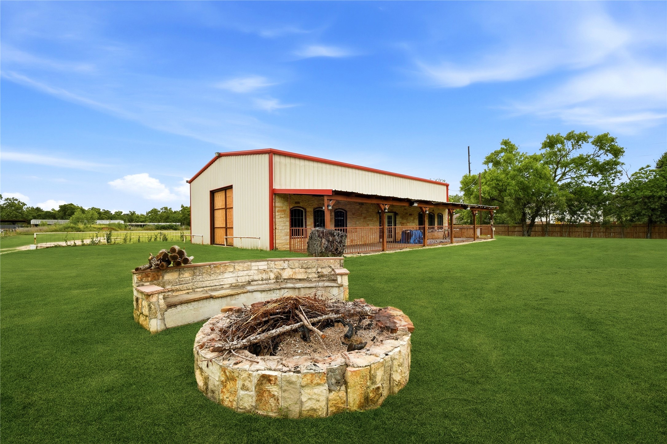 11741 Ezekiel Road Tomball, TX 77375 - Photo 10 of 30 a front view of a house with a yard fountain