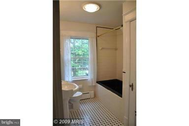 1953 Seminary Road Silver Spring, MD 20910 - Photo 20 of 23 a bathroom with a sink and a shower