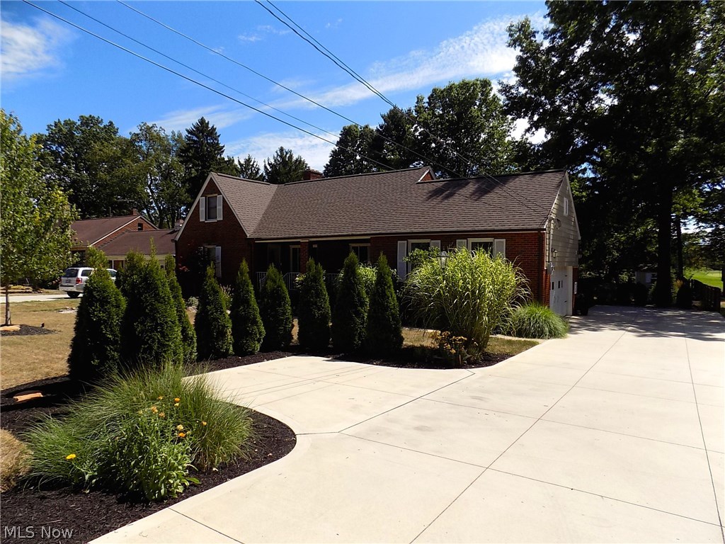 25769 Butternut Ridge Road North Olmsted, OH 44070 - Photo 21 of 35 Lots of room for guests on this pristine extra wide & long concrete driveway with landscaped turnaround! Also, stamped concrete front walkway & back patio.
