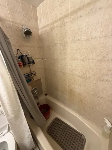 a bathroom with a bathtub