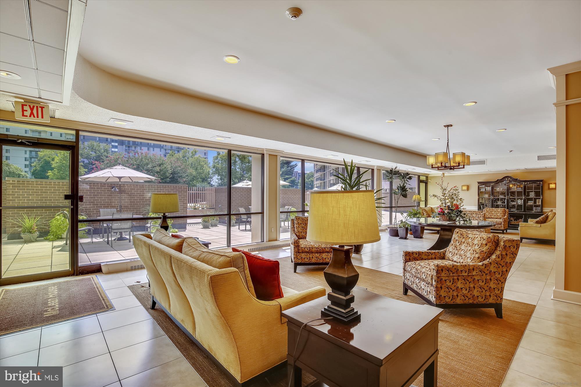 6800 Fleetwood Road, Unit 1004 McLean, VA 22101 - Photo 25 of 40 Inviting lounge with natural light and views.