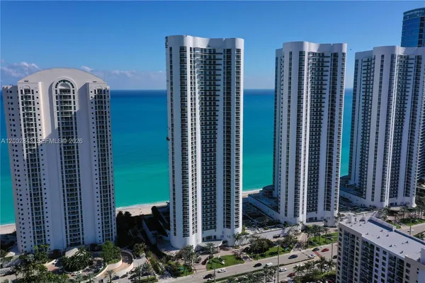 a view of a city with tall buildings