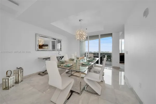 a view of a dining room with furniture