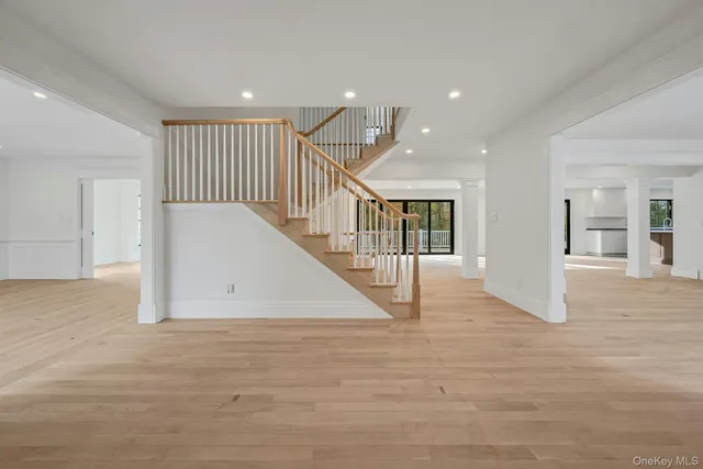 a view of a hallway with staircase