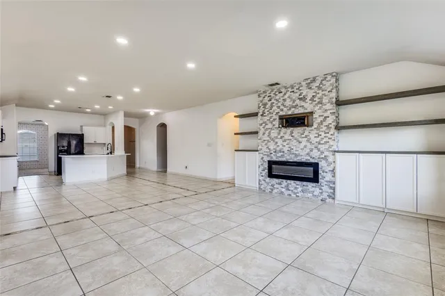 a view of kitchen appliances with cabinets