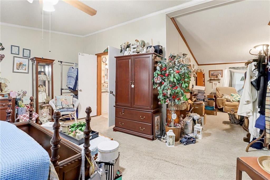 99 James Drive Hampton, GA 30228 - Photo 16 of 25 a view of a room with gym equipment